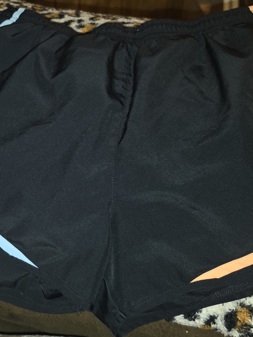 Women’s Black NIKE Athletic Shorts with Blue/ Orange Accents. WORN ONCE SZ MED.